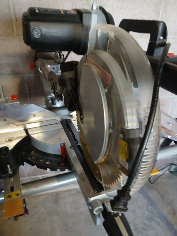 Dual-Bevel Sliding Compound Miter Saw with LED and Laser Guide. 