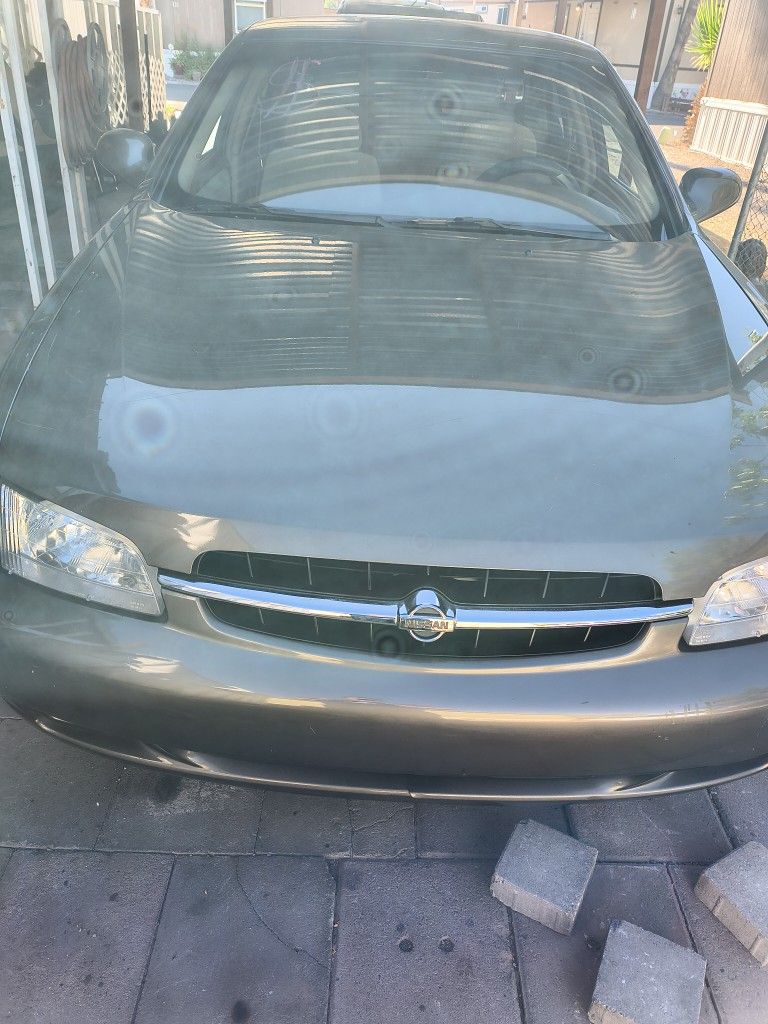 Vendo Olocanbio Nissan Altima 0ocasmilla
