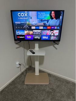 UHD TV, Stand, Soundbar, Amazon Fire Stick