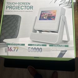 Touchscreen portable projector