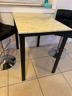 Marble Top Bar Height Dining Table w barstools.