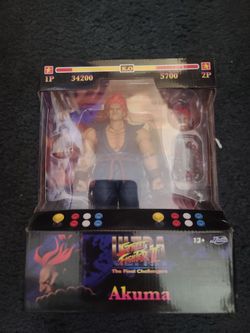 Jada toys street fighter Akuma and Vega figures