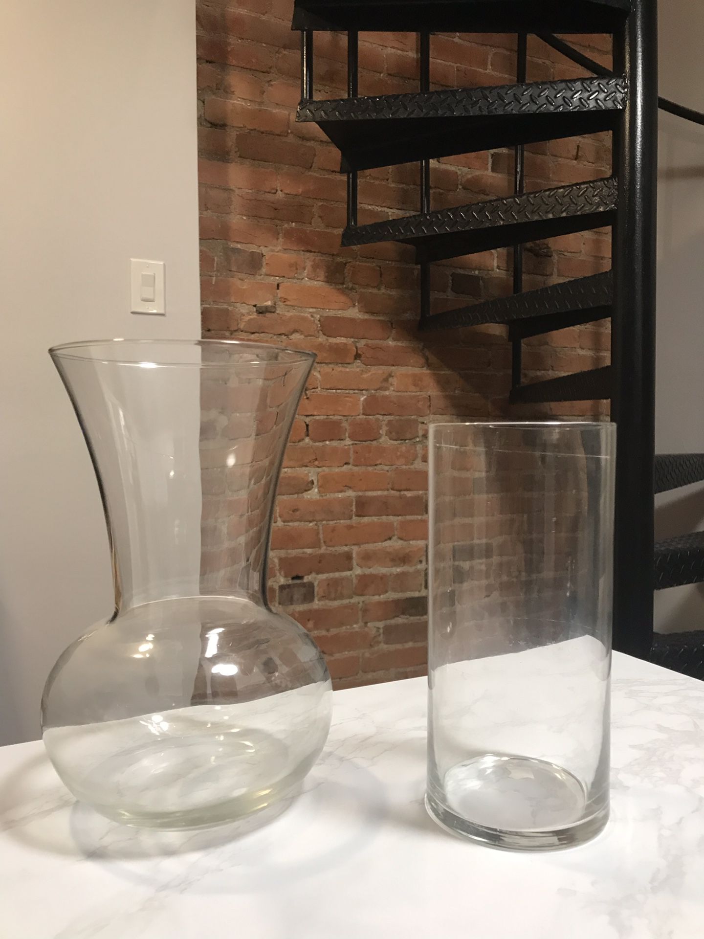 Two glass flower vases