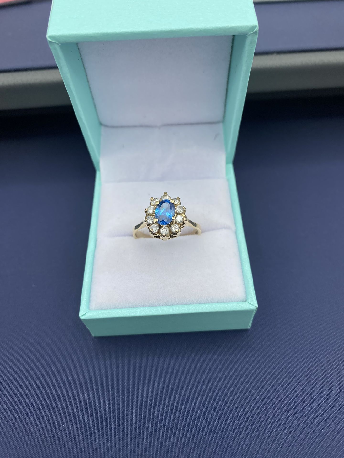 Vintage-Inspired Blue Topaz Halo Ring in 14K Yellow Gold