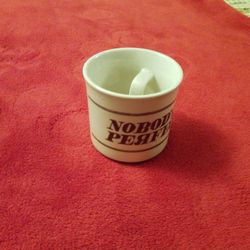 Funny Cup With Misspelled Logo And Handle Inside The Cup.