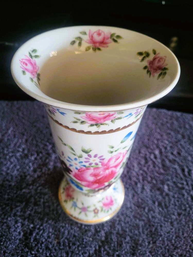 Beautiful flowered vase - 9.5" Tall - It feels hand painted but I'm not sure-Selling for an estate