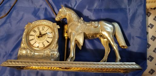 Antique horse clock