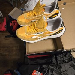 Yellow Rebook Size 11