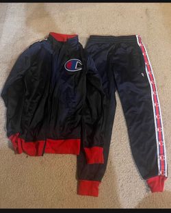 Kids track suit size m about 8-10