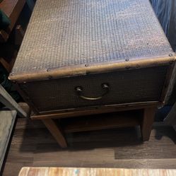 E Cane & Leather Trunk with felt lined drawer on a wood side table 