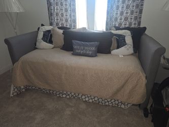 Gray Upholstered Daybed Frame with trundle and 2 twin mattresses