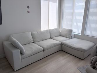 White Modular Sectional Sofa with Ottoman