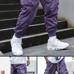 Manfinity EMRG - Men’s  Flap Pocket Side Drawstring Waist Oversize Cargo Baggy Pants  Purple / 36 (S) | Material: Fabric, Composition: 100% Polyester 