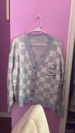 Light blue hello kitty sweater (M)