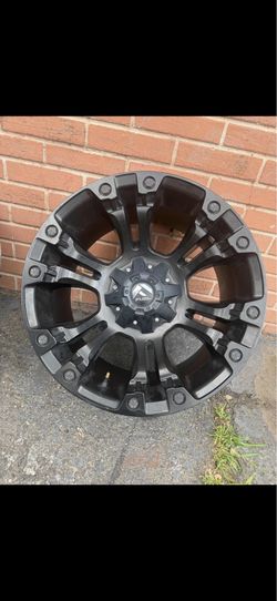 4 Fuel Off-Road matte black wheels (20” diameter, aggressive multi-spoke / concave truck & SUV style)