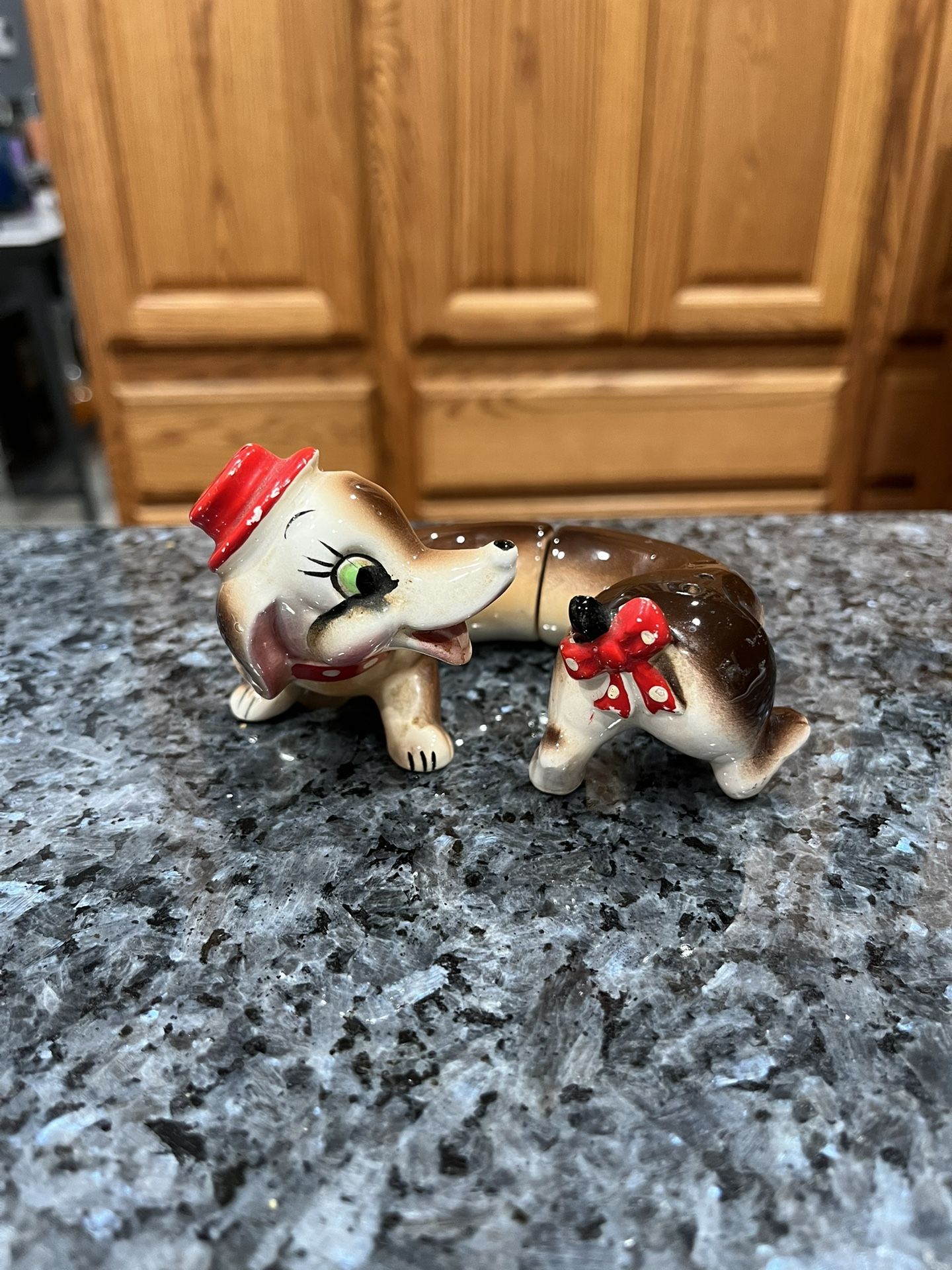 Vintage Ceramic Artmark hand painted Wiener Dog Salt and Pepper “Hi Friend” with red hat. Preowned the hat has paint wear due to age. See pictures.