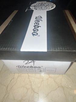 Woman’s Weeboo sz 8 slides. Yellow
