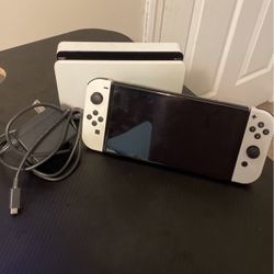 Nintendo Switch Oled with accessories 
