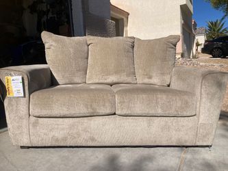 New Loveseat By Ashley
