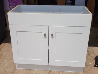 Brand New 36-in Vanity Cabinet in White Only. Sink not included.