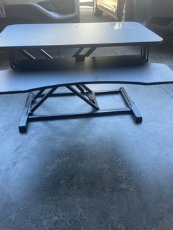 Black adjustable standing desk
