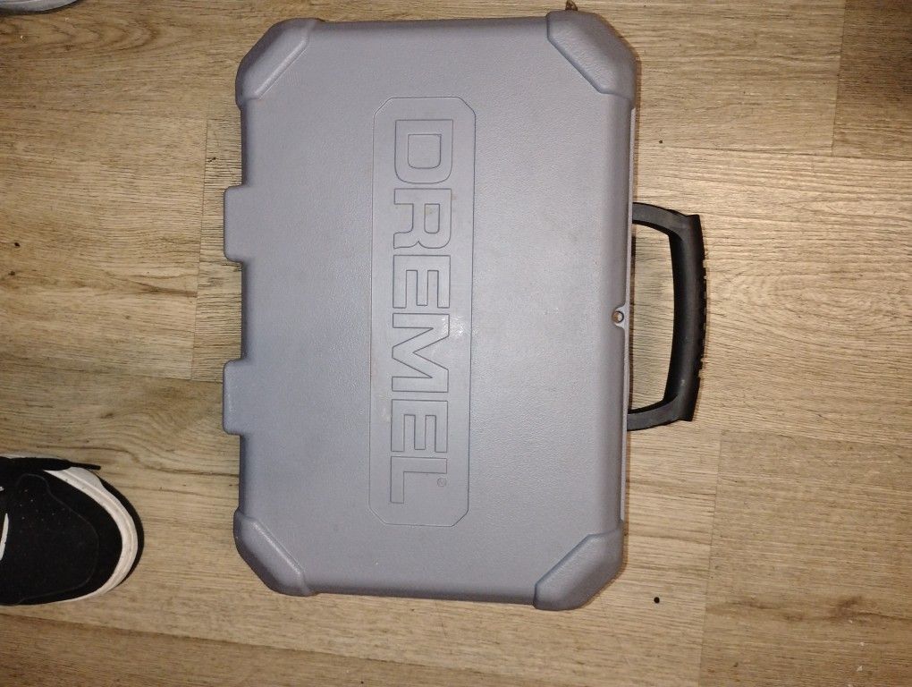 Brand New Dremel In The Case With Attachments