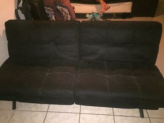 Black swayed futon