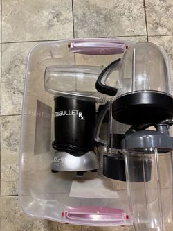 NutriBullet Rx blender set with multiple cups, containers and accessories.