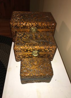Three boxes With beautiful carvings on boxes three different sizes