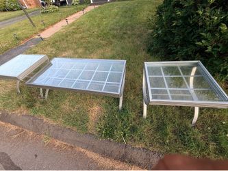 Glass top tables. Sets of 3