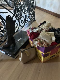 Box full of clothes, shoes, purses