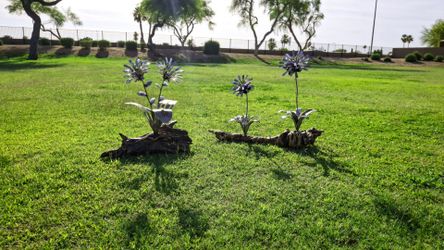 Handmade metal/ironwood sculptures