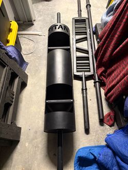 Strongman log, cambered bar