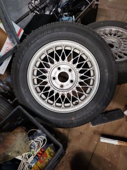 (4) 15 Inch Rims with 2 Tires