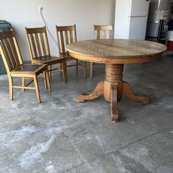 Oak Table And Four Chairs