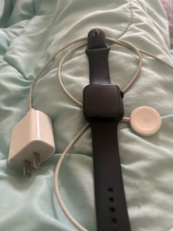 Apple Watch with Charger and Adapter
