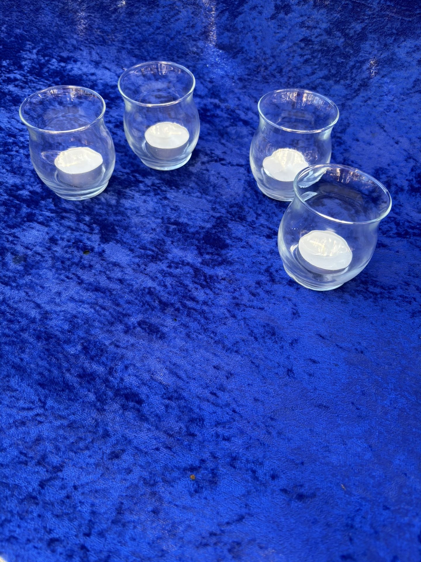 Four piece candle holders altogether $5