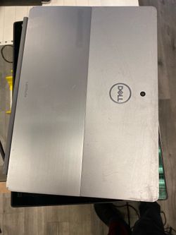 Dell latitude 7200 2 in 1 laptop  I7-8665 @ 1.9 GHz 16GB RAM  256GB SSD  Windows 11 pro Small crack in the left corner of the screen. Don’t affect the
