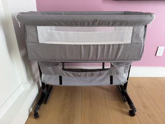 Gray Baby Bassinet with Storage Shelf
