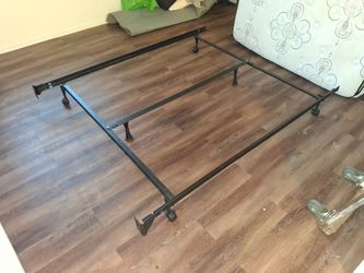 Nice Strong and Sturdy Queen-size Adjustable Black Metal Bed Frame with Wheels