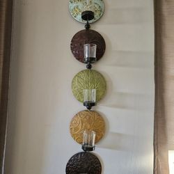 Tuscan-style metal wall candle holder