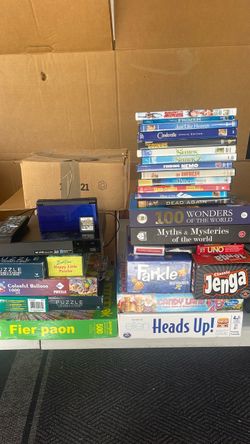 Nintendo DS, DVD Player, Assortment of DVDs, Puzzles and. Board Games