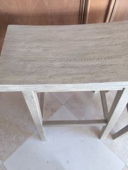 William Sonoma light wood saddle counter/bar stools