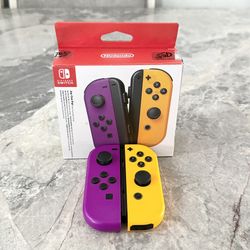 Nintendo Switch Joycons Purple and Yellow with Box 