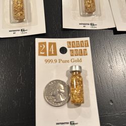 Gold flakes in a tiny bottle