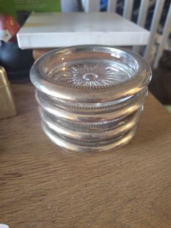 4 silver plated Coasters