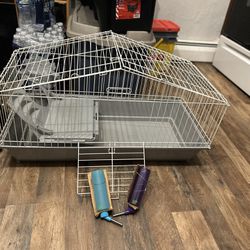 Animal Cage, And Water Bottles