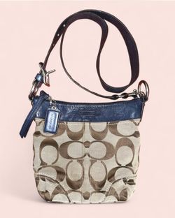 Coach signature canvas and leather shoulder bag with navy blue accents