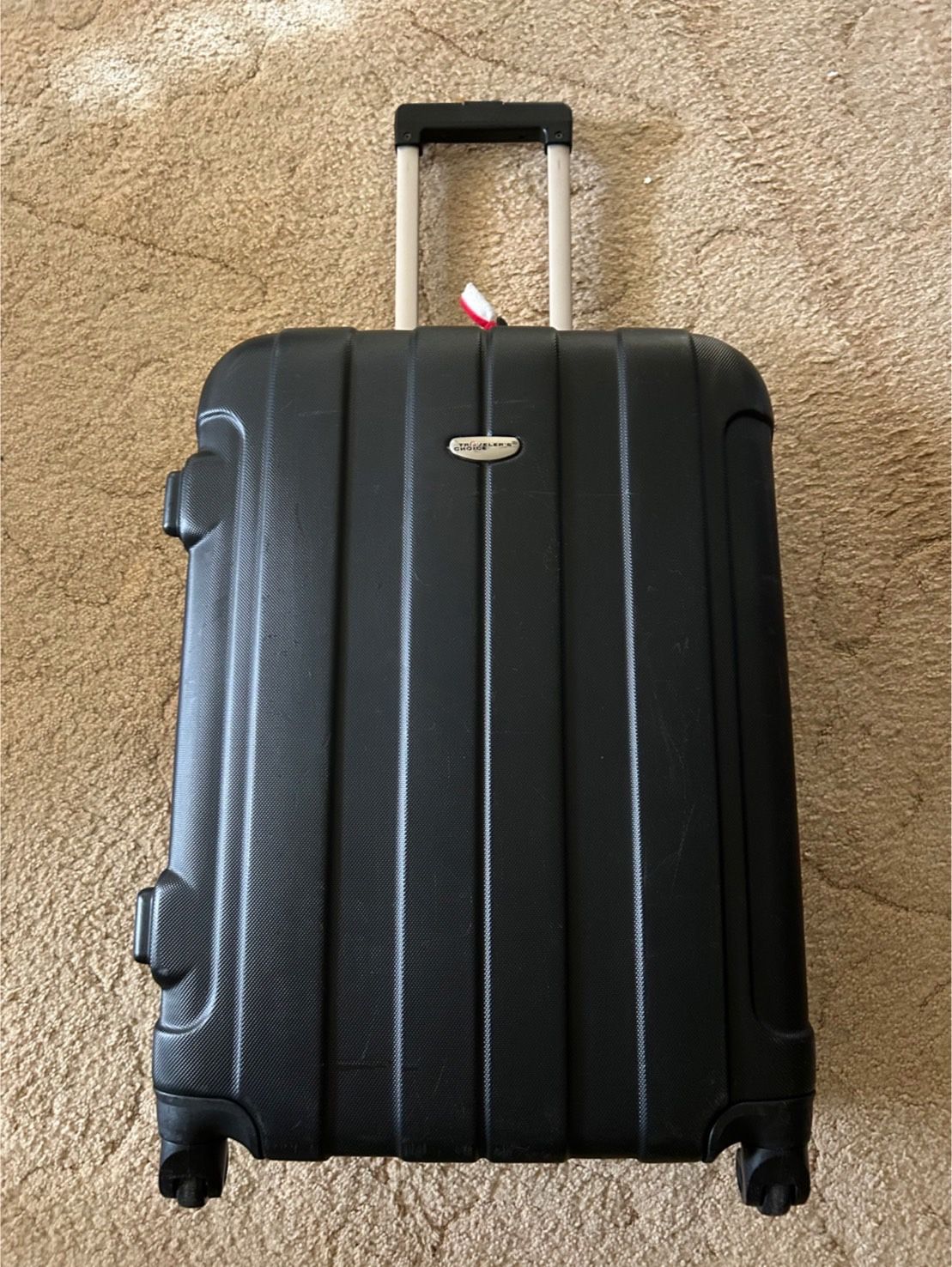 TRAVELER'S CHOICE CHECK IN LUGGAGE Size : 25 ＂H x 17.5 ＂W x 9 ＂D Original price $150up