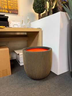 Black & gold plastic planter